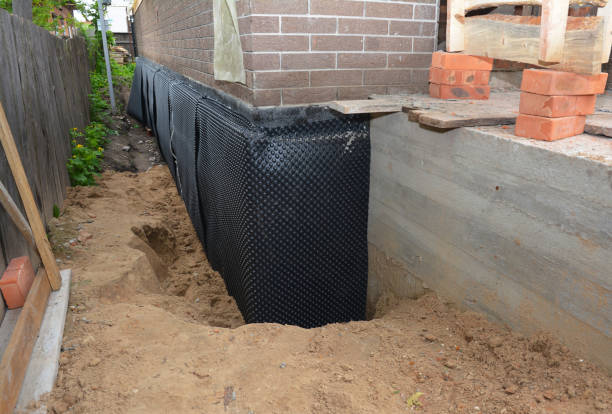 Happy homeowners after waterproofing job in Brookside